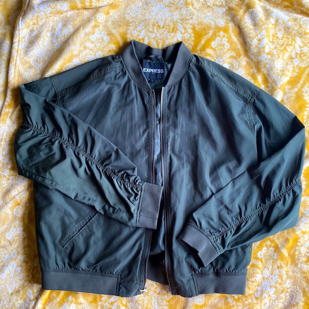 Green Express Windbreaker, size small, lightly worn.